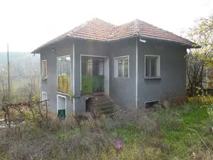An old rural house with nice plot of land located near fores