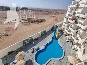 Pool view studio for sale in Tiba View residential compound