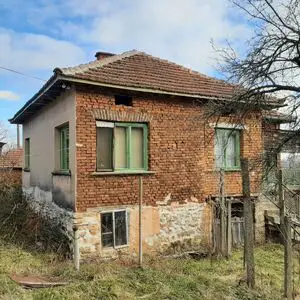 Old house with land located in mountain area 30 km from town
